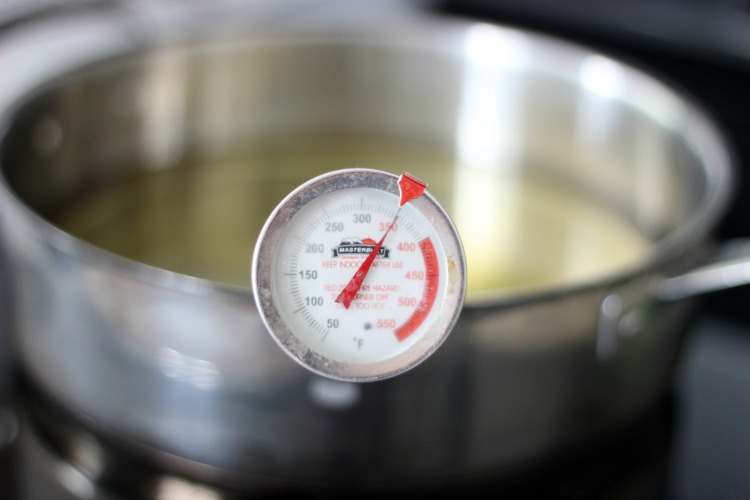 oil thermometer in pan of oil