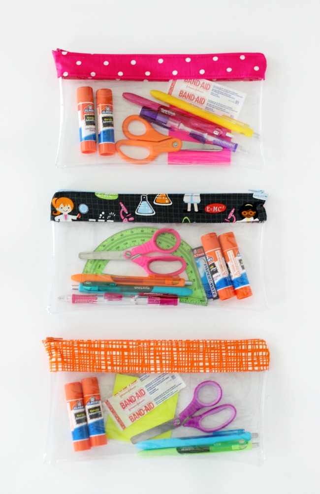 clear vinyl pencil pouches filled with school supplies