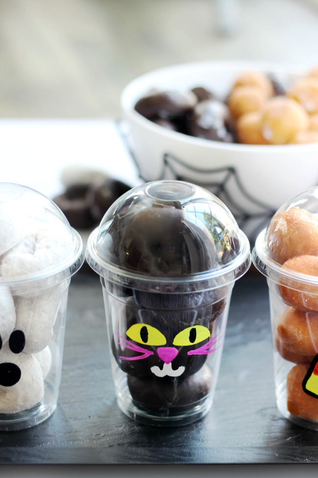 black cat donut cup with chocolate donuts