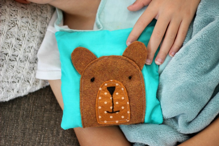 teddy bear rice pack with child