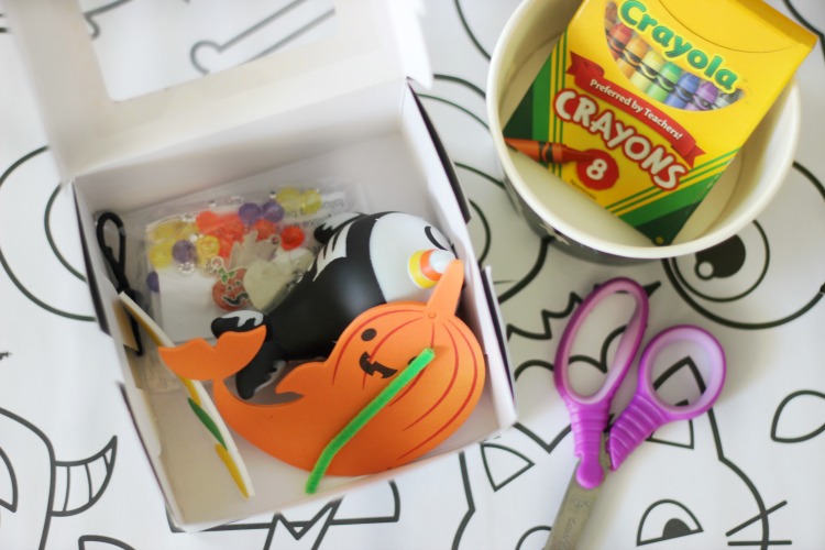 black craft box with halloween craft kits inside