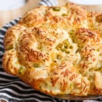 Jalapeño cheese bread in a glass pie pan.