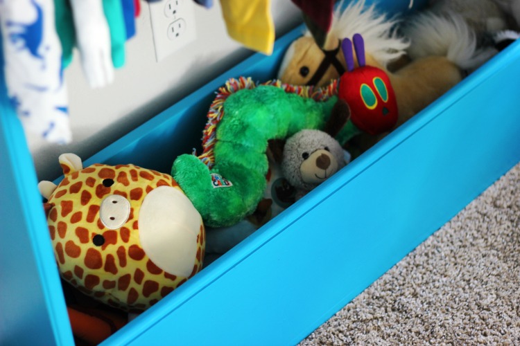 kids wardrobe storage bin with stuffed animals