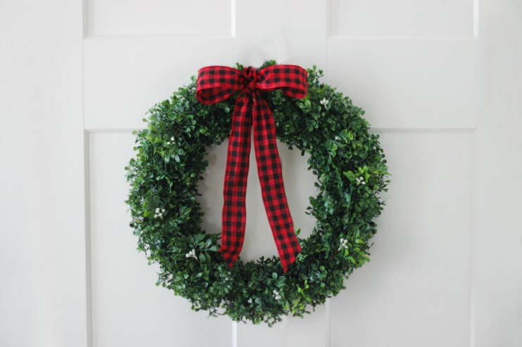 holiday boxwood wreath red ribbon