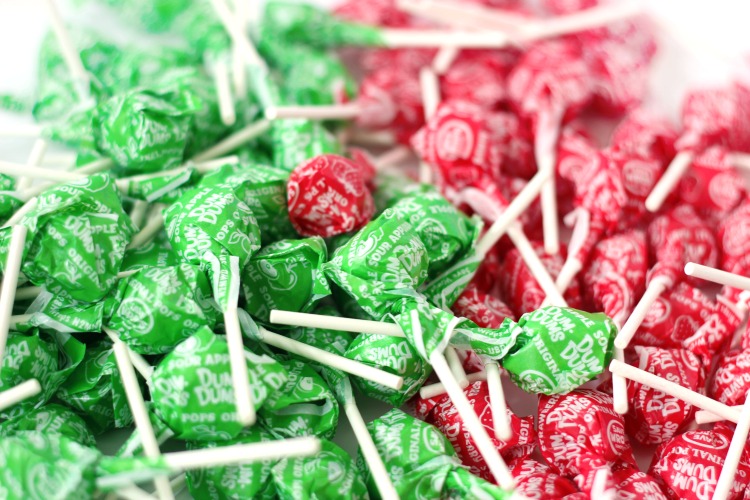 red and green dum dum lollipops