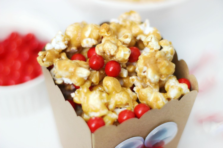 caramel popcorn with red sixlets candies