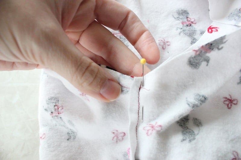 Pant legs pinned together.