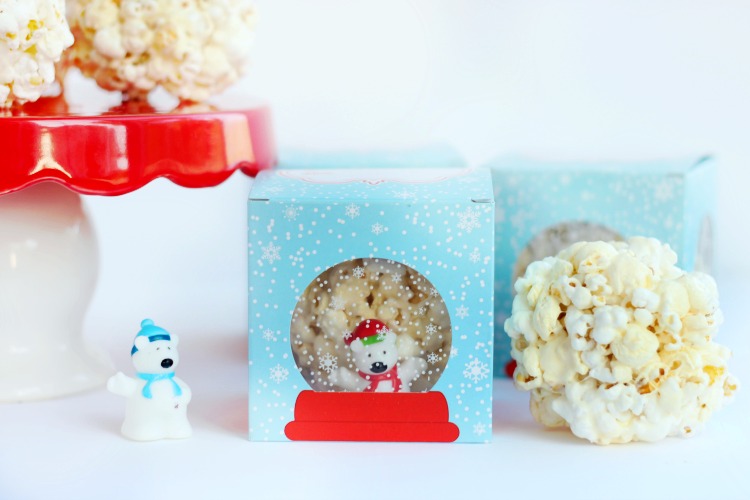 marshmallow popcorn balls inside snow globe boxes