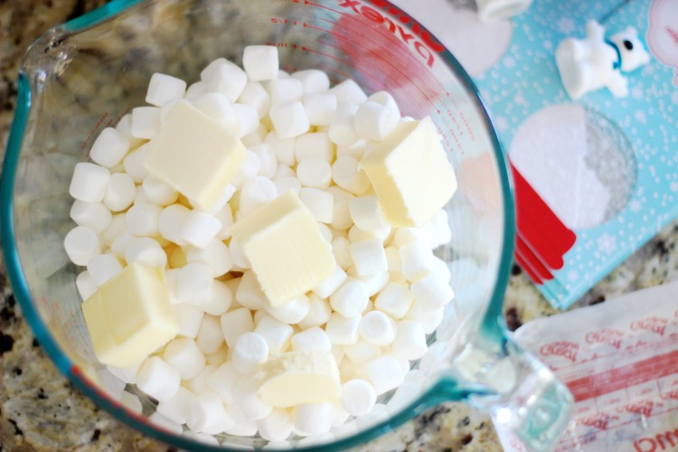 butter and marshmallows in bowl to be microwaved