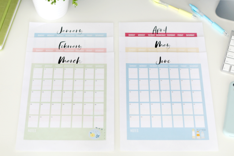 2020 printable calendar pages arranged on a table