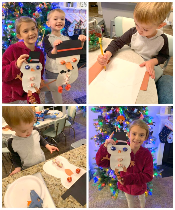 kids making chocolate snowman craft