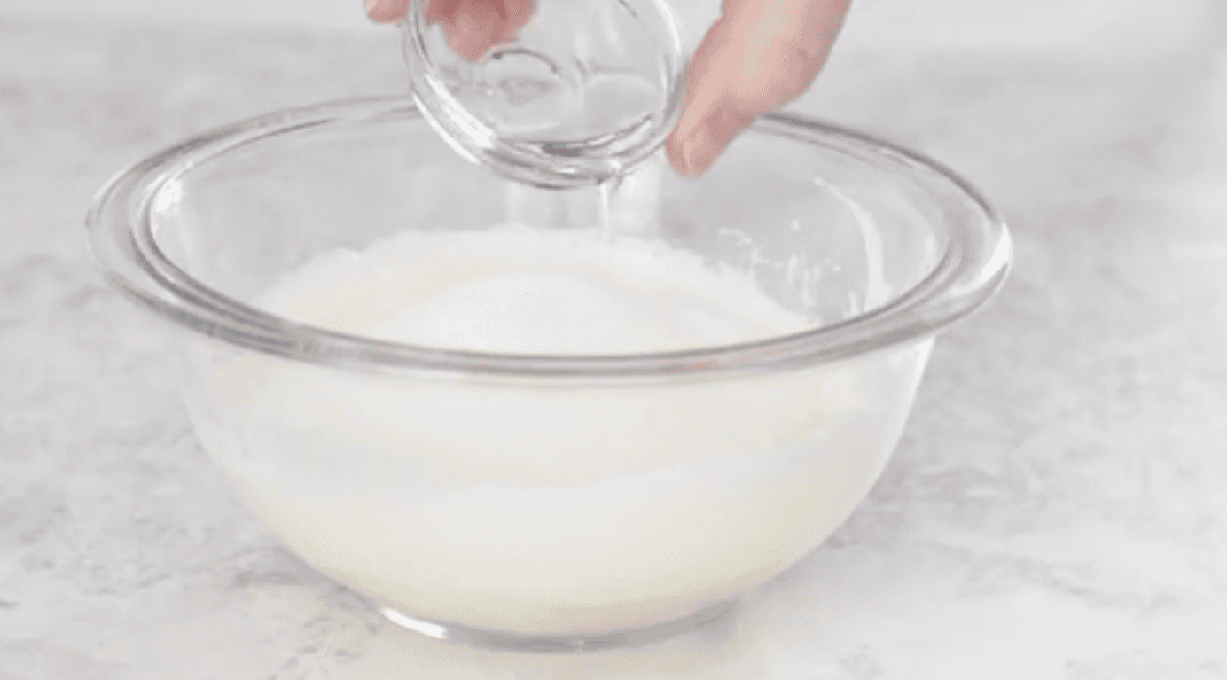 Glass bowl of fortune cookie batter.