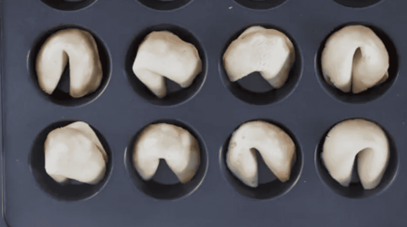 Muffin pan of fortune cookies.