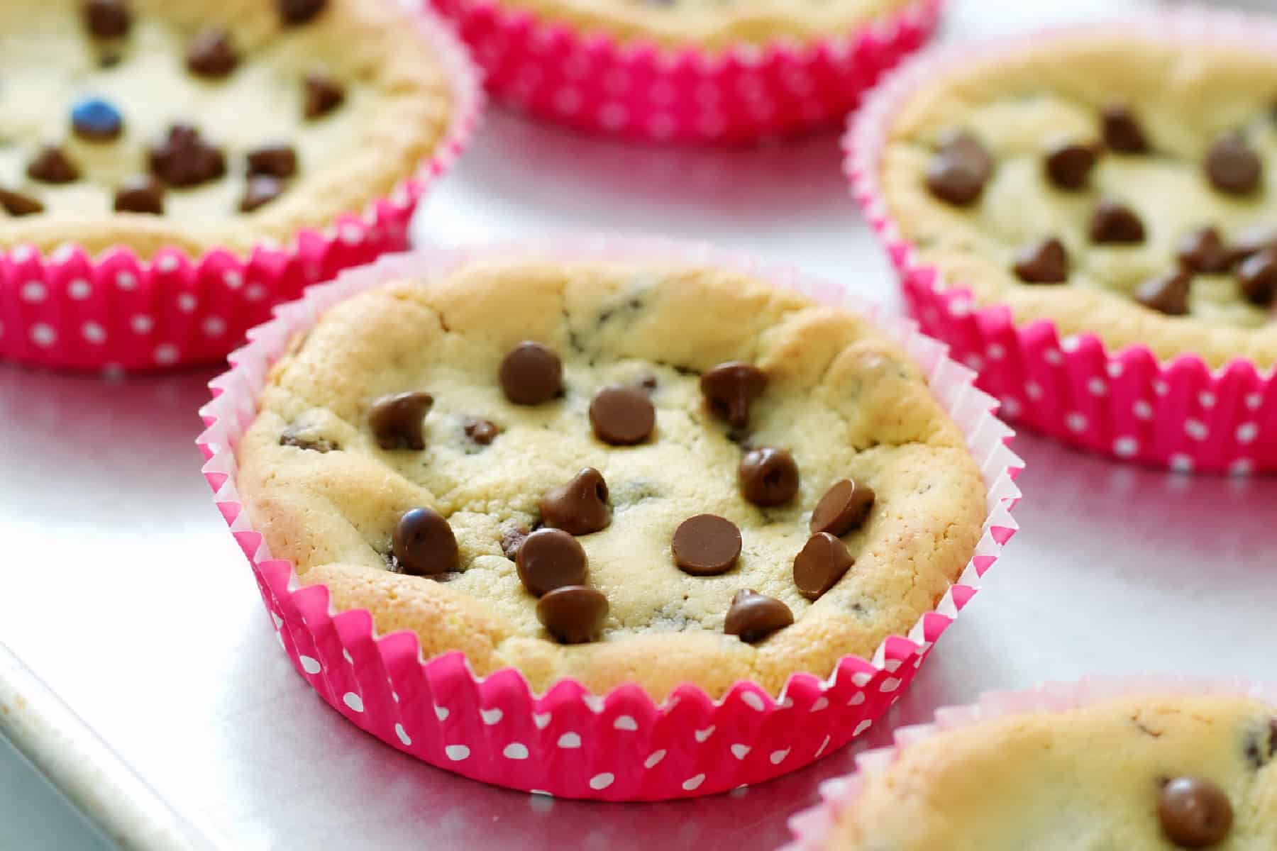 Deep dish cookies in pink polka dot baking liners.