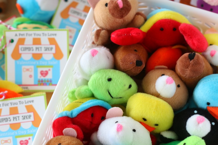 mini plush animals inside white basket