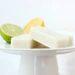Lotion bars on a white pedastal platter.
