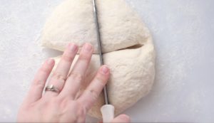dividing dough into 4 sections