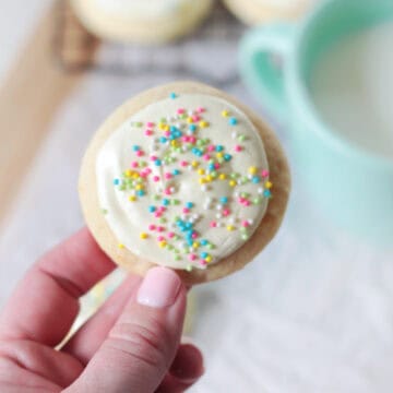 hand holding soft sugar cookie