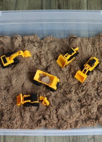 construction toys in sandbox