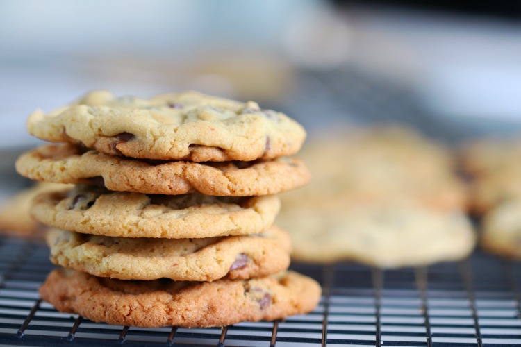 stack of chocolate chip cookies on cooling rack