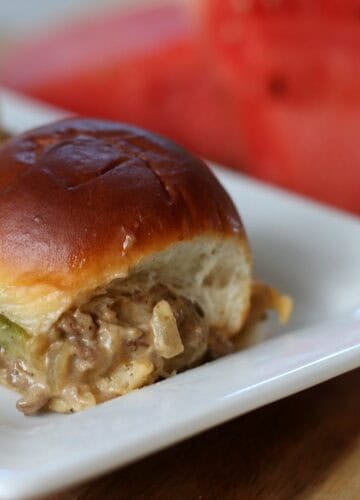 cheesesteak sloppy joe sliders on platter