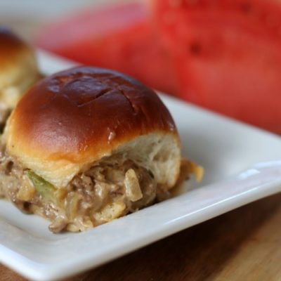 cheesesteak sloppy joe sliders on platter