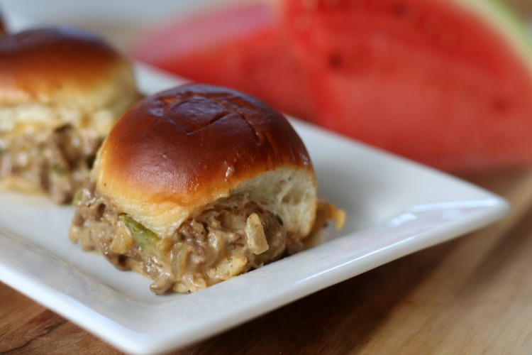 cheesesteak sloppy joe sliders on platter