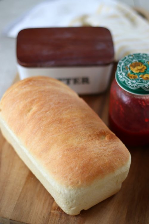 loaf of english muffin bread on cutting board