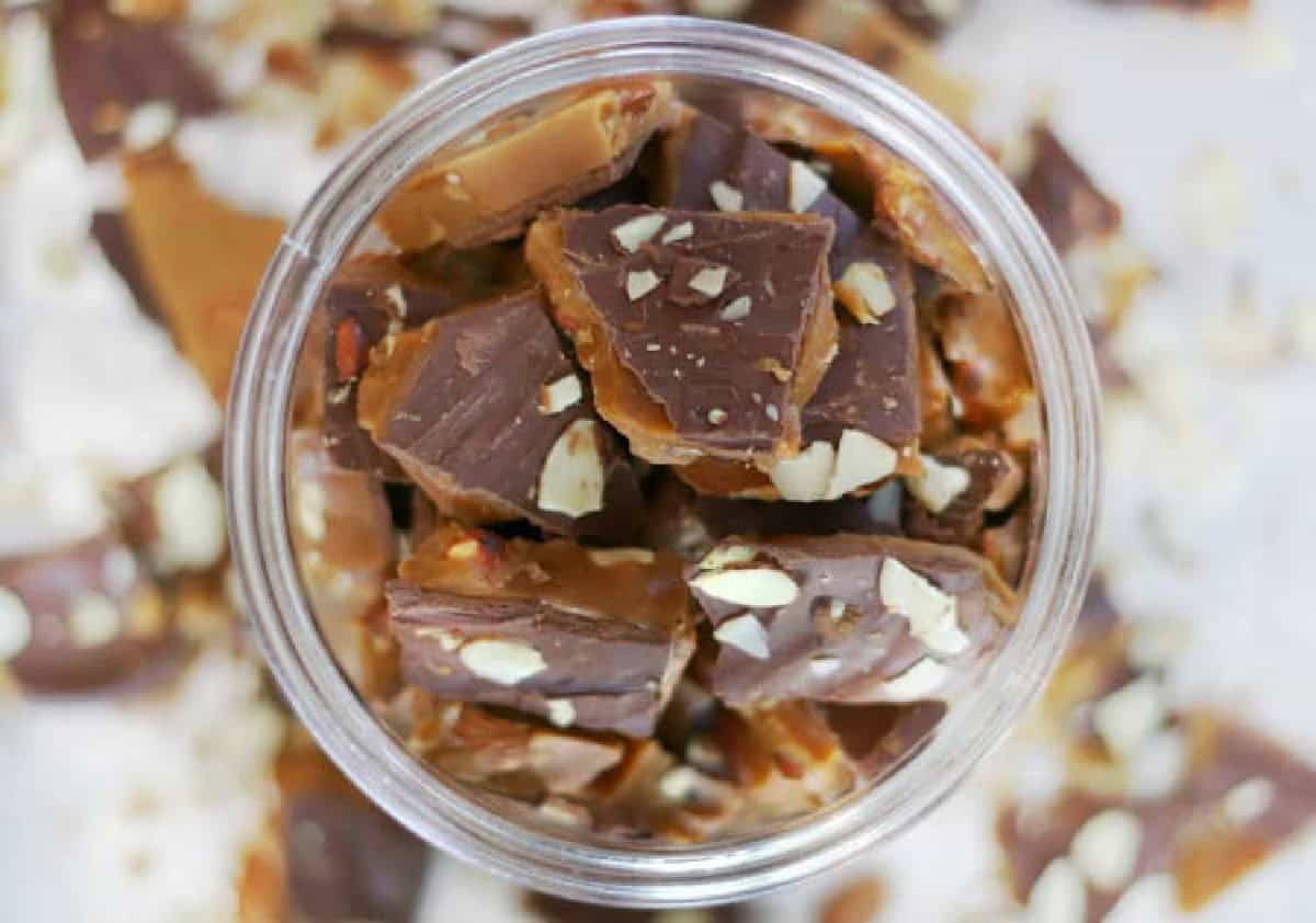 Jar of English toffee with almonds.