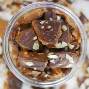 Jar of classic engligh toffee with almonds.