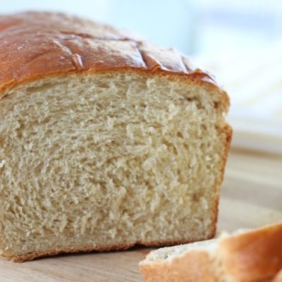 honey white bread with one slice cut from it