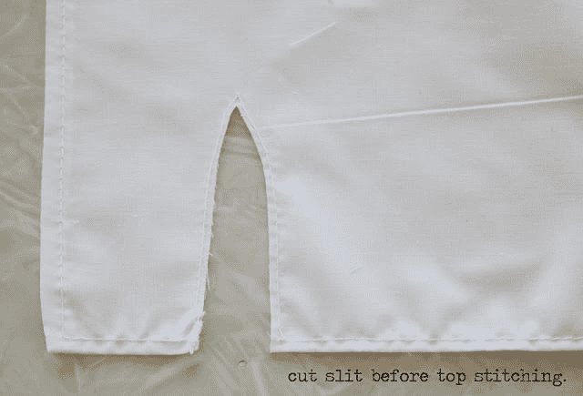 White apron front with slit cut out.