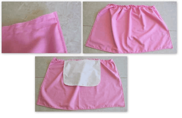Pink skirt with white apron front sewn across center.