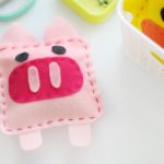 pig softie on sewing table