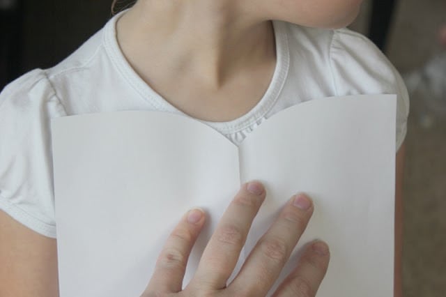bodice pattern held up on child for visual