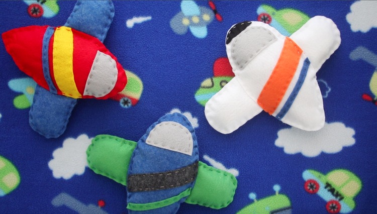 3 airplanes made with airplane sewing pattern