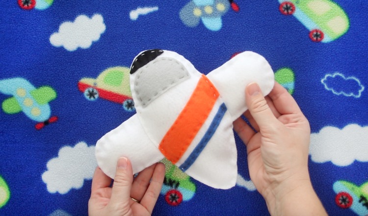 white coast guard c-130 felt airplane