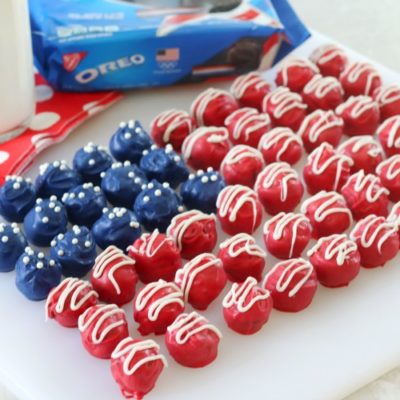 red white and blue Oreo truffles arranged on white plate