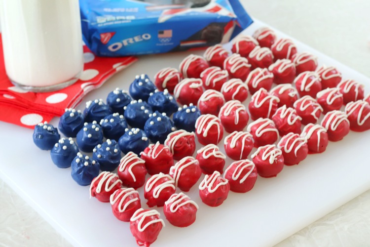 red white and blue Oreo truffles arranged on white plate