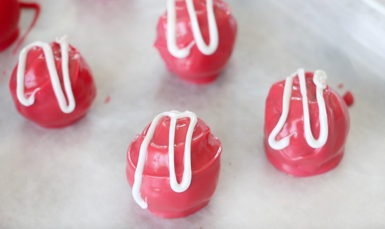 red Oreo truffles drizzled in white chocolate