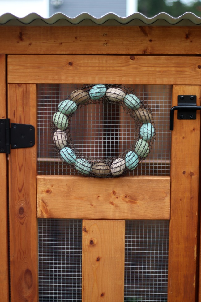 chicken coop wreath on door