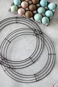 two wire wreath frames spray painted brown