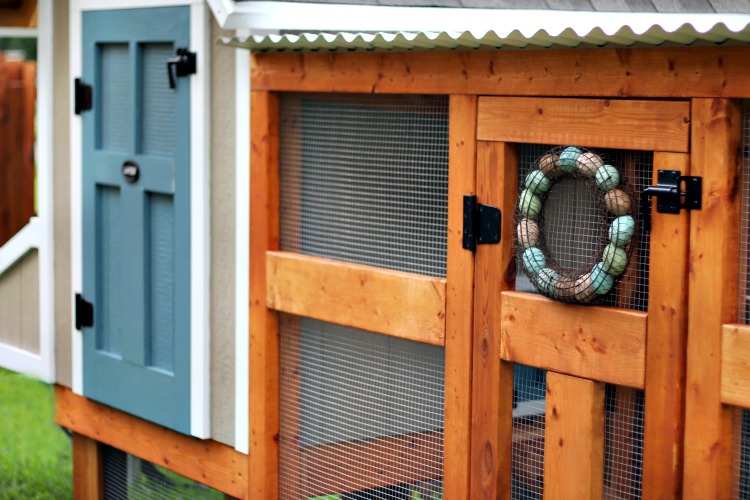 wreath hanging on chicken run door