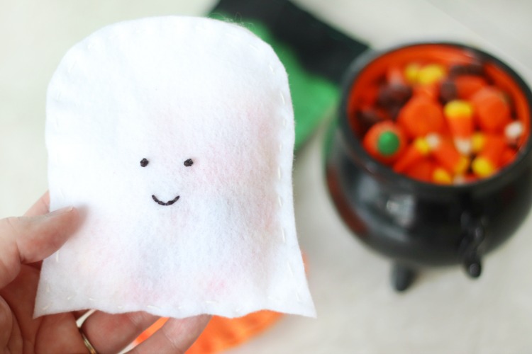 white felt ghost candy pouch