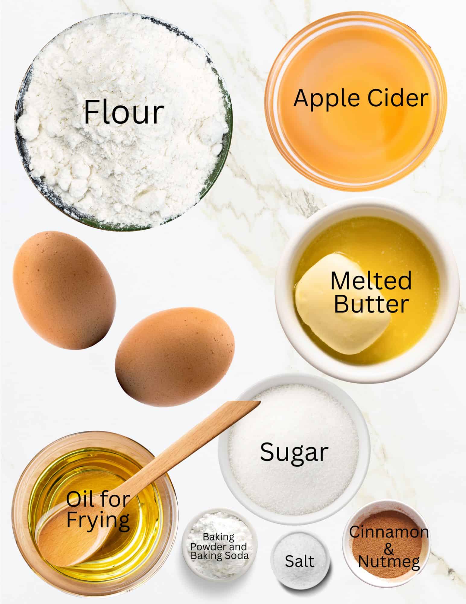 Bowls of flour, apple cider, melted butter, sugar, baking soda, baking powder, salt, cinnamon, nutmeg, oil and 2 eggs.