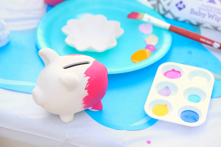 pink piggy bank and paint palette