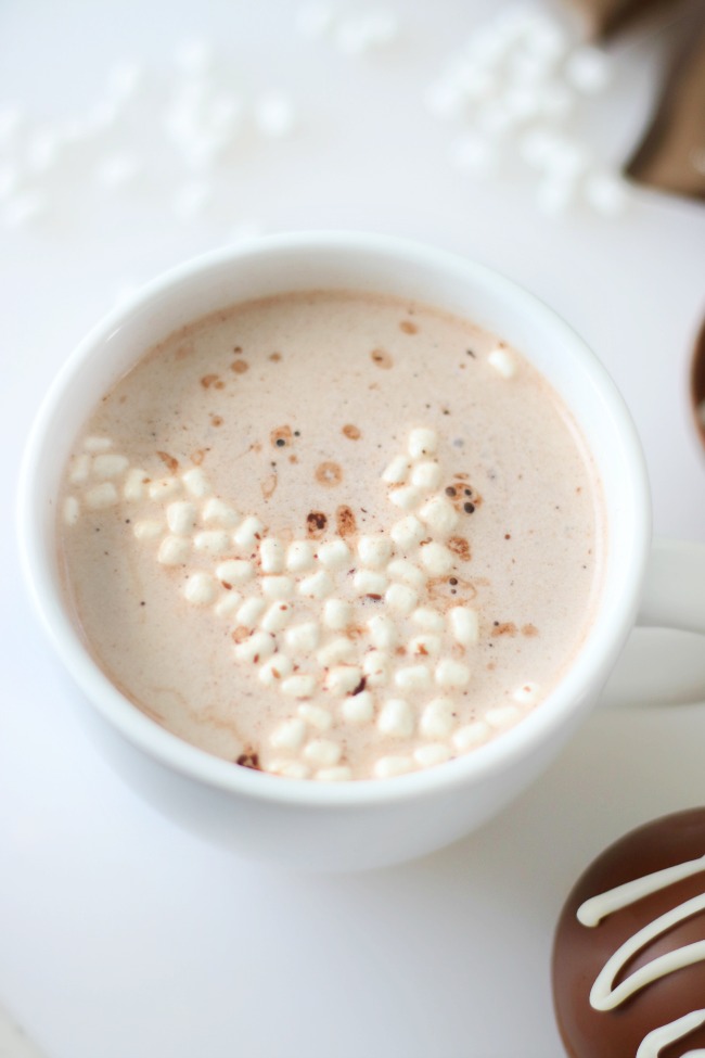 white mug with hot chocolate and marshmallows
