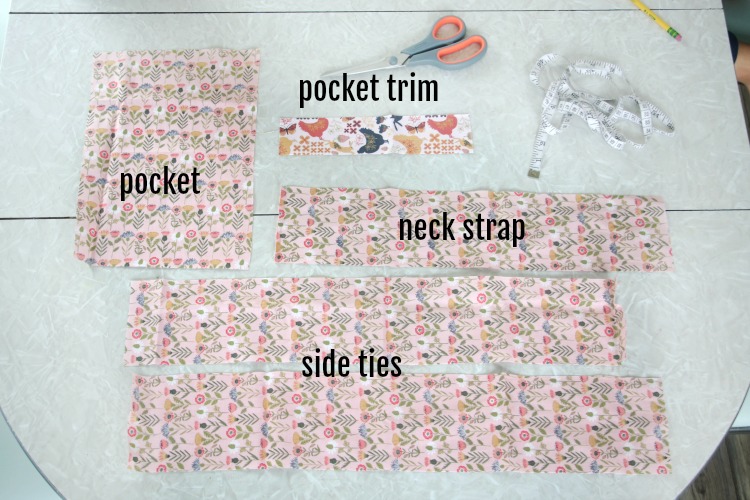 layout of fabric pieces needed to make kids apron