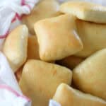 Basket of dinner rolls.