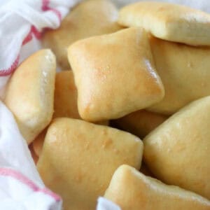 Basket of dinner rolls.